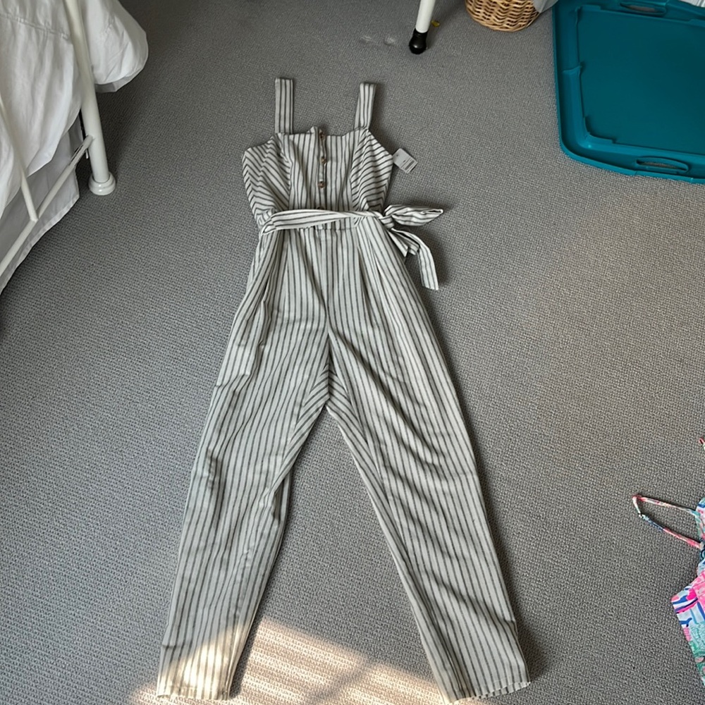 Striped jump suit tags still on!